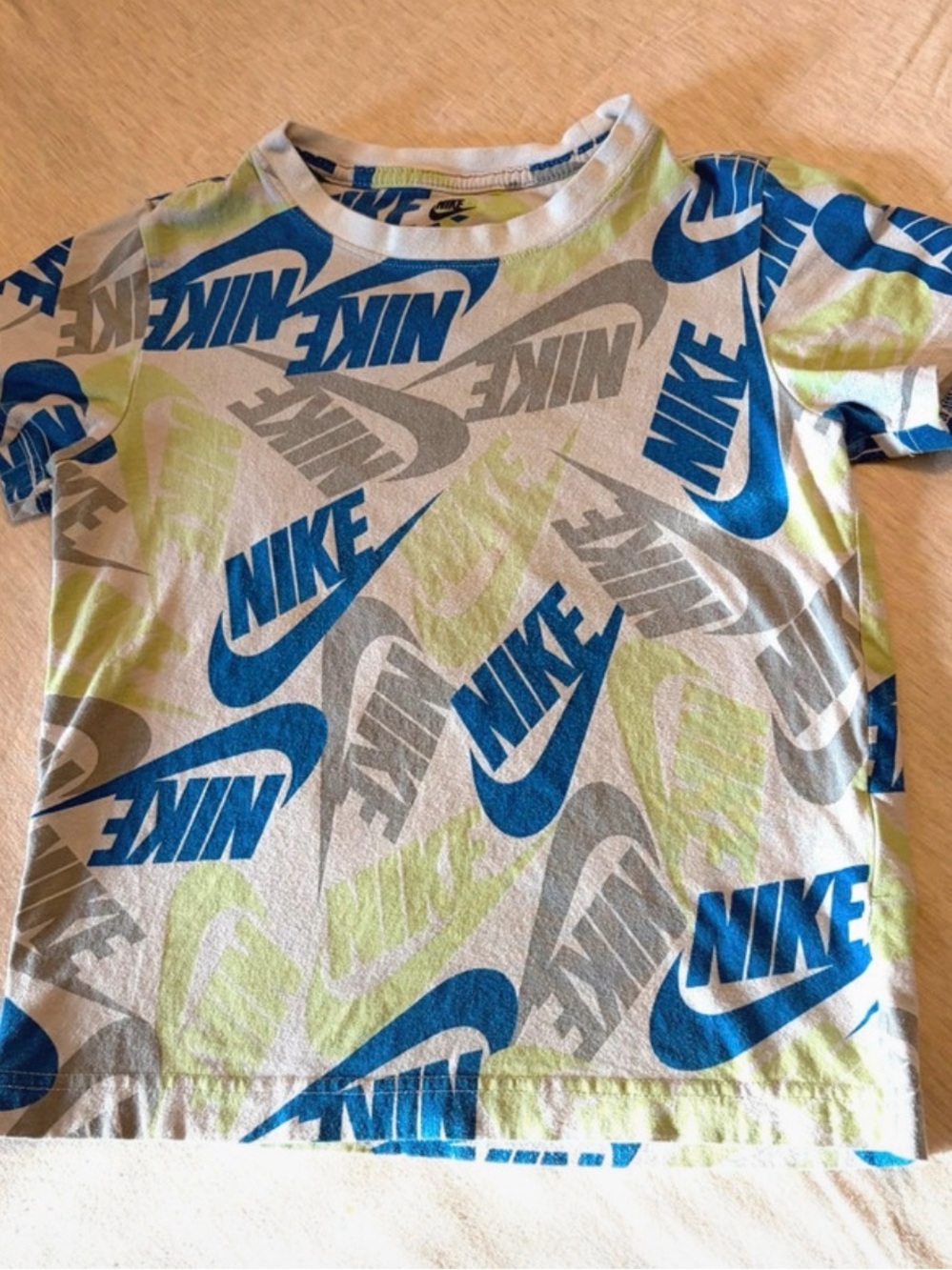 Nike Kids Short Sleeve All-Over Logo Tee in Blue, Lime & Gray